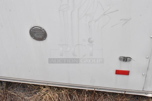 2020 ATX 8.5' x 24' trailer exterior. Features ventilation, lock, and reflectors. Equipped with CaptiveAire, Arctic Air units.