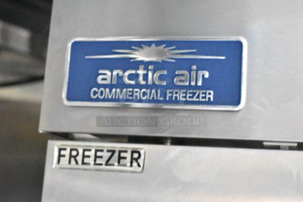 Arctic Air commercial freezer label on the ATX cold food and beverage fulfillment trailer, showcasing brand and type.