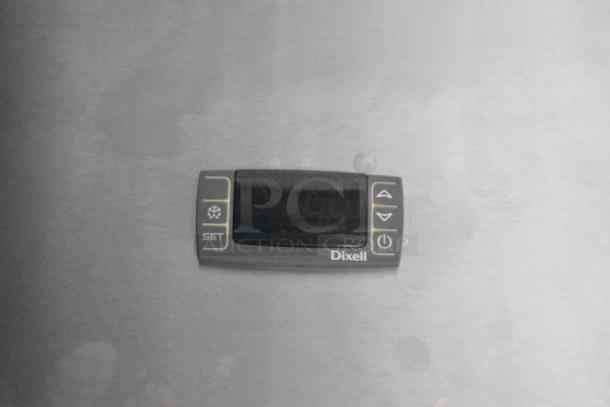 Dixell digital control panel on 2020 ATX food trailer, used for temperature regulation in Arctic Air appliances.