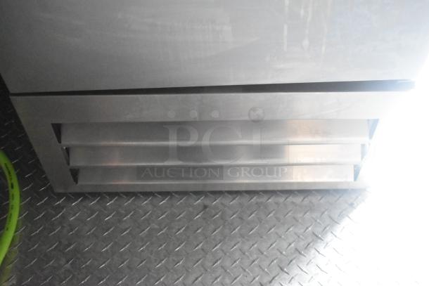 ATX cold food trailer interior showing CaptiveAire hood and stainless steel features. Part of 2020 beverage trailer setup.