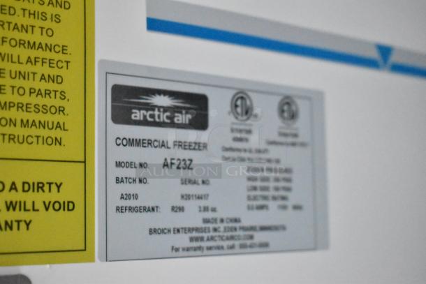 Label on Arctic Air commercial freezer model AF23Z with serial and batch number details, indicating refrigerant type R290.