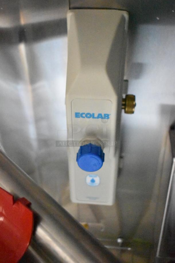 Ecolab dispenser inside 2020 ATX 8.5' x 24' food trailer. Features include CaptiveAire hood, Arctic Air equipment, clear title.
