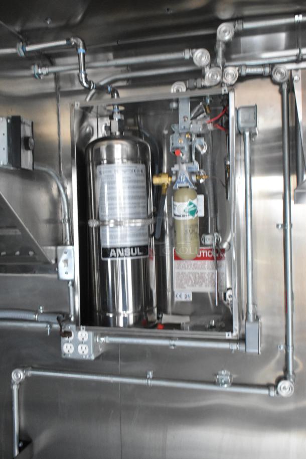 2020 ATX trailer with CaptiveAire grease hood and Ansul fire suppression system. Visible wiring and plumbing included.