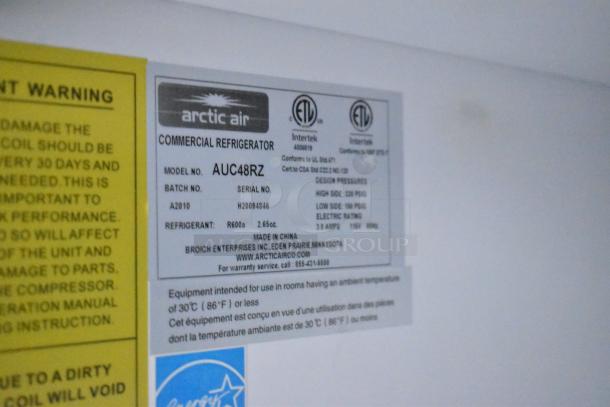 Label of Arctic Air Commercial Refrigerator Model AUC48RZ, showing certifications, refrigerant details, and manufacturer info.