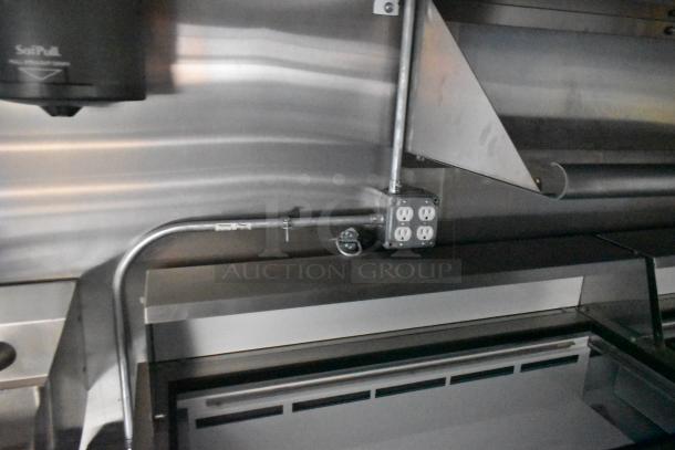 Interior of 2020 ATX 8.5' x 24' food trailer showing electrical outlets, stainless steel surfaces, and ventilation system.