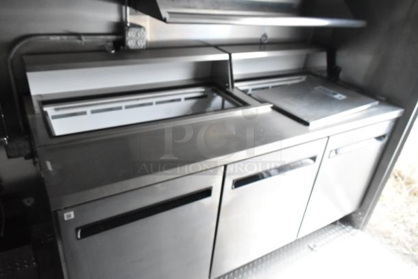 2020 ATX 8.5' x 24' food trailer with CaptiveAire grease hood, Arctic Air prep tables, coolers, freezers, and IT cabinet.