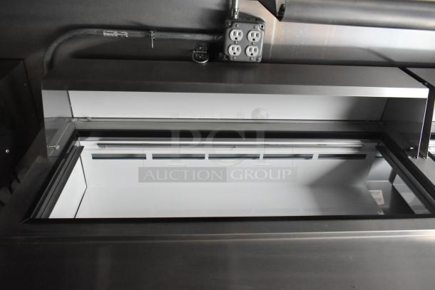 2020 ATX 8.5' x 24' cold food trailer interior with Arctic Air cooler, electrical outlets, and stainless steel surfaces.