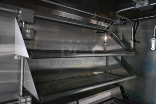 2020 ATX 8.5' x 24' trailer interior with stainless CaptiveAire grease hood, fire suppression system, power outlets.