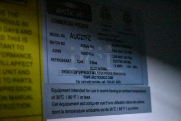 Label on Arctic Air commercial freezer model AUC27FZ, showing batch A0008, serial 03097644, made by Broich Enterprises.