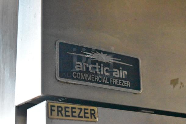Arctic Air commercial freezer with visible label indicating model. Part of 2019 Cruising Kitchens trailer setup.