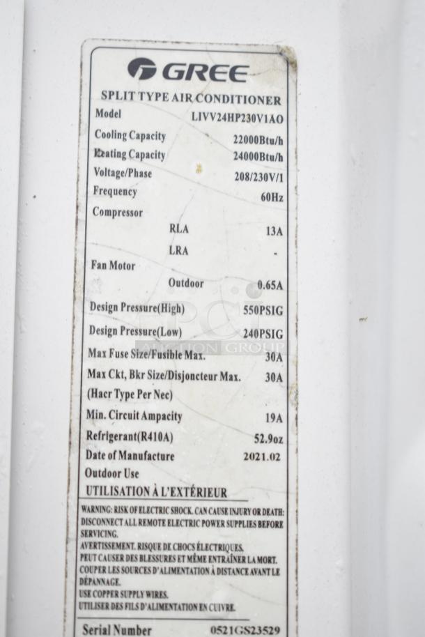 Gree split type air conditioner label with model LIVV24HP230V1AO, cooling capacity 22000Btu/h, manufactured 2021.