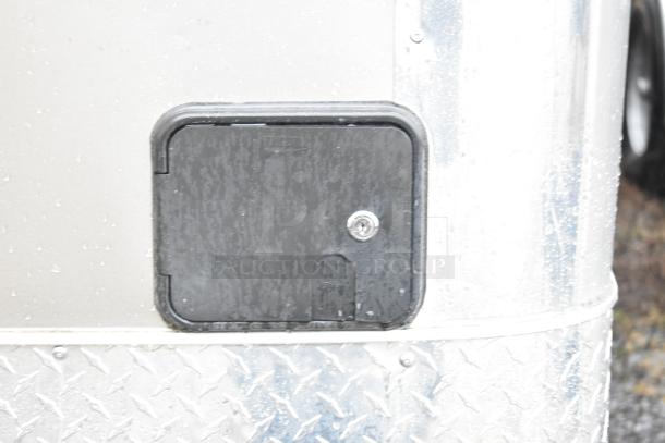 2021 Nationwide 8.5' x 24' food trailer shell, exterior water inlet shown; steel finish, ready for custom equipment.