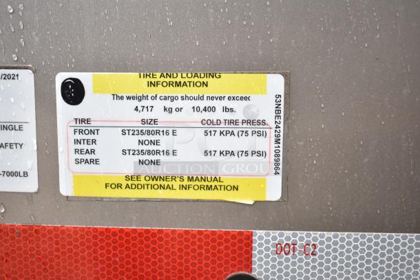 Tire and loading information label for 2021 Nationwide 8.5' x 24' food trailer shell; max cargo 10,400 lbs, tire size ST235/80R16 E.