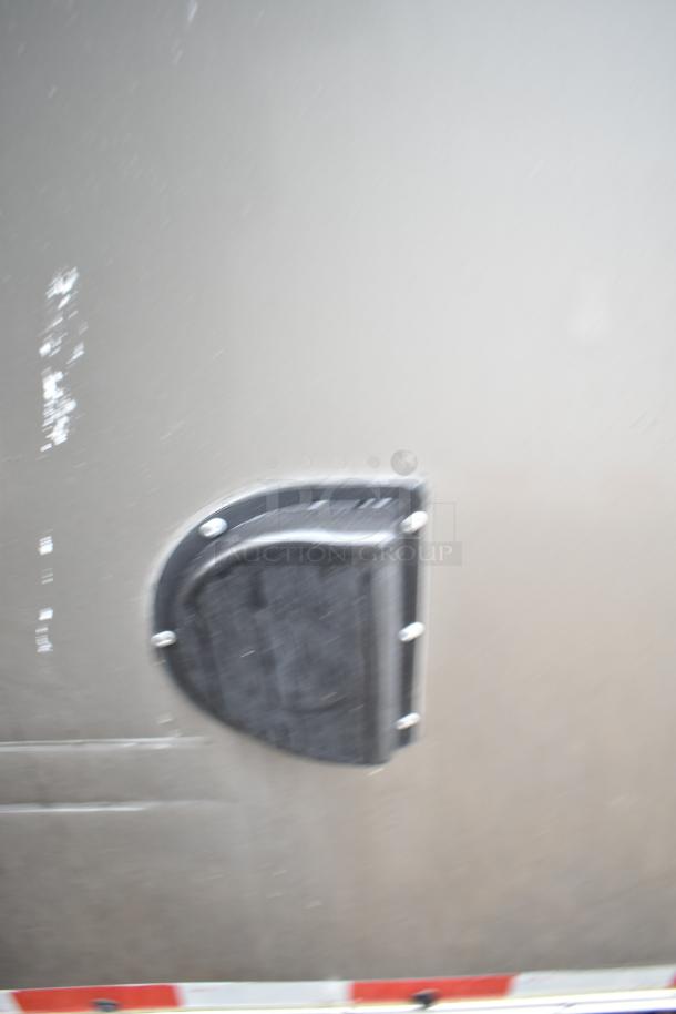 2021 Nationwide 8.5' x 24' food trailer shell, ready for customization, with wear marks and minor exterior scratches.