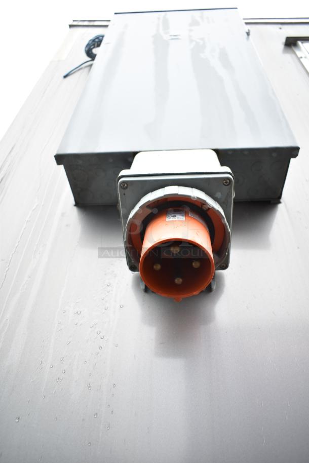 Close-up of a power connection on a 2021 Nationwide 8.5' x 24' food trailer shell, ready for customization.