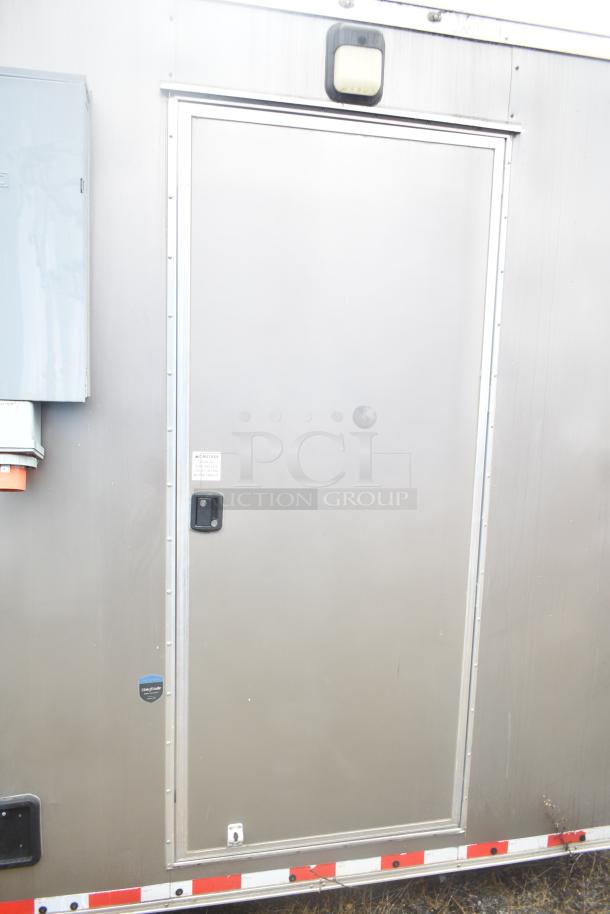 2021 Nationwide 8.5' x 24' food trailer shell, silver exterior, door with handle, electrical panel, sold with clear title.