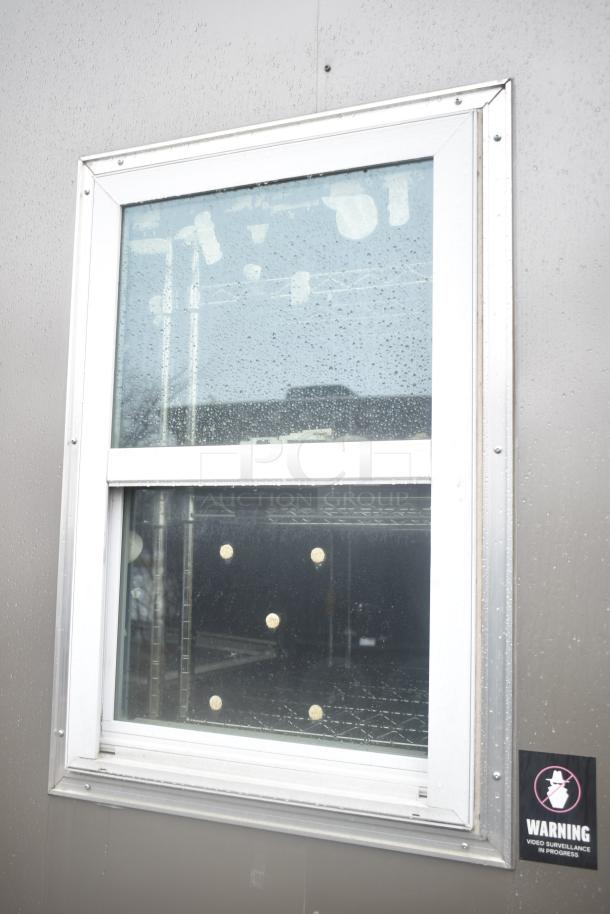 2021 Nationwide 8.5' x 24' food trailer shell, ready for customization. Visible window and warning sign. Sold with clear title.