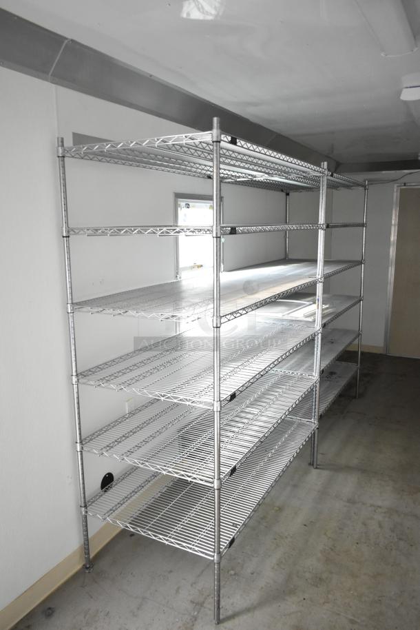 2021 Nationwide 8.5' x 24' food trailer shell with wire shelving units, ready for customization, sold with clear title.