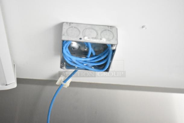 2021 Nationwide food trailer interior wiring. Blue cables secured in a metal box. Ready for customization.