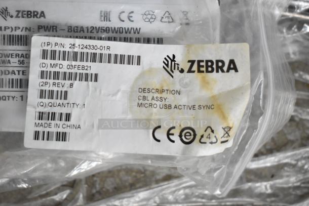 Plastic bag with Zebra label for Micro USB Active Sync cable, P/N: 25-124330-01R, MFD: 03FEB21, made in China.