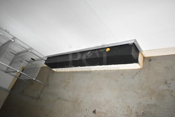 2021 Nationwide 8.5' x 24' food trailer shell interior with wire shelving unit, ready for customization, sold with clear title.