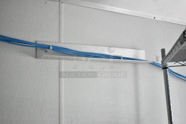 2021 Nationwide 8.5' x 24' food trailer shell, includes wire shelving units, Martin IT/Network cabinet; ready for customization.