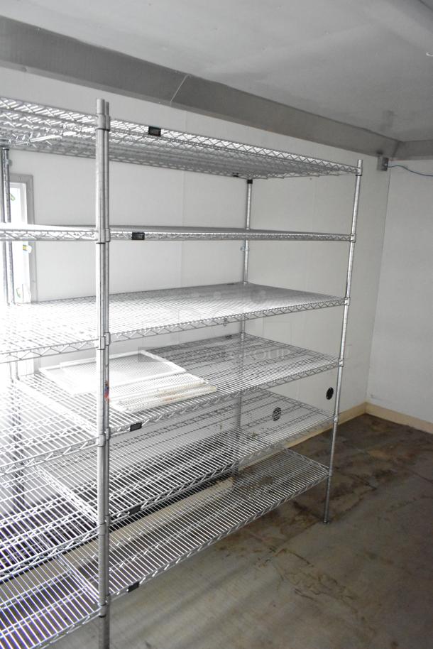 2021 Nationwide 8.5' x 24' food trailer shell interior with wire shelving units; clear title; ready for customization.