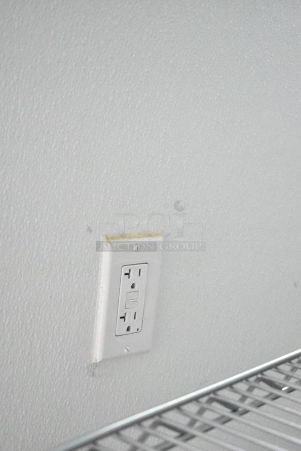 2021 Nationwide 8.5' x 24' food trailer interior; features electrical outlet, ready for customization with shelving and appliances.