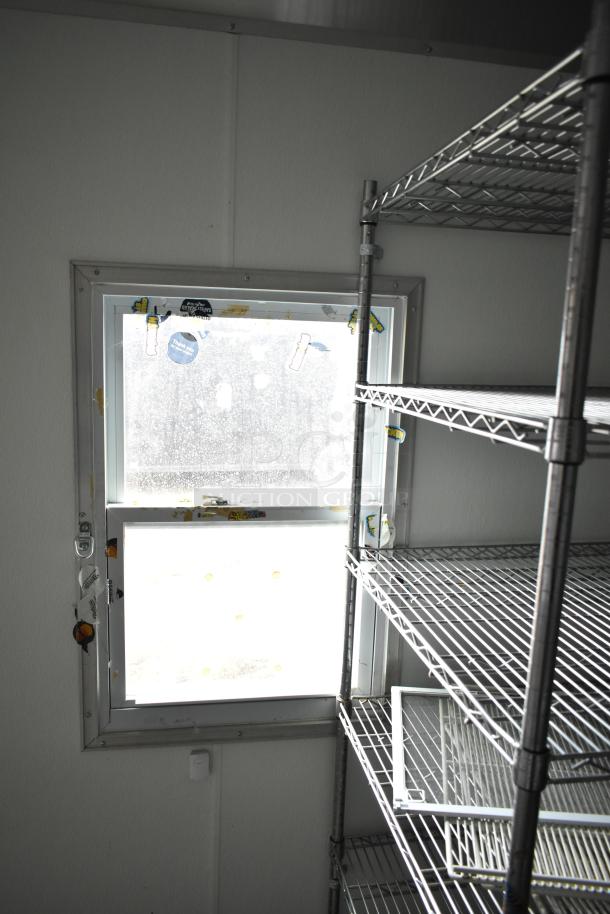 2021 Nationwide 8.5' x 24' food trailer shell, wire shelving, window with decals, ready for equipment, clear title.