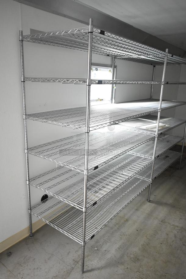 2021 Nationwide 8.5' x 24' food trailer shell with wire shelving units. Ready for customization. Sold with a clear title.
