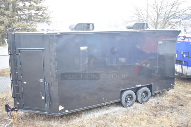 2020 SDG 8.5' x 20' black food trailer shell, ready for customization; features include sinks, wire shelving, Martin IT cabinet.