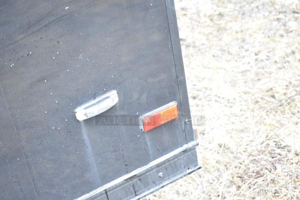 2020 SDG 8.5' x 20' food trailer shell; black exterior, clear title, ready for customization, includes Martin IT/Network cabinet.