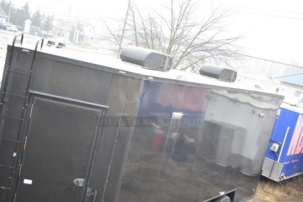 2020 SDG 8.5' x 20' black food trailer shell, ready for customization, includes roof vents, clear title.