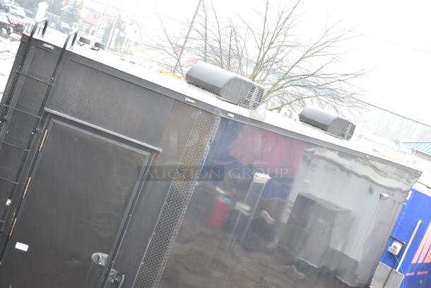 2020 SDG 8.5' x 20' black food trailer shell with rooftop units, ready for custom equipment. Sold with clear title.