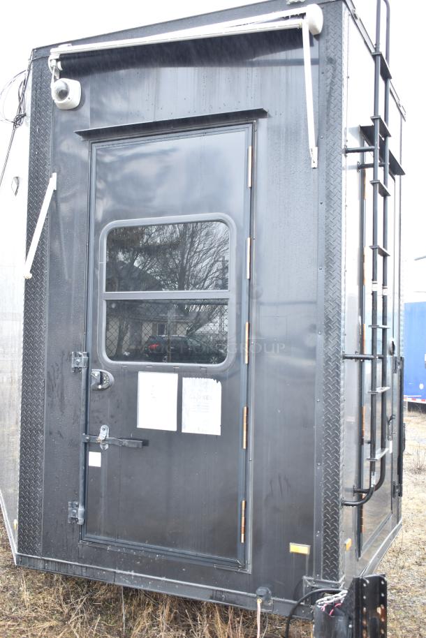 2020 SDG 8.5' x 20' black food trailer shell, ready for customization. Includes wire shelving, IT cabinet, clear title.