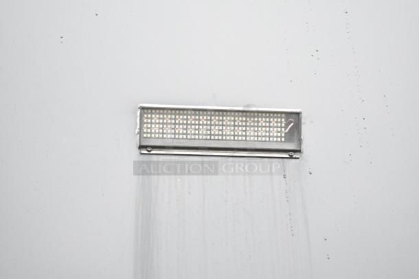 LED light fixture on the exterior of a 2020 SDG 8.5' x 20' food trailer shell.