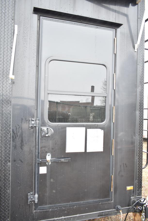 2020 SDG 8.5' x 20' black food trailer shell, secure door with lock, ready for equipping. Sold with a clear title.