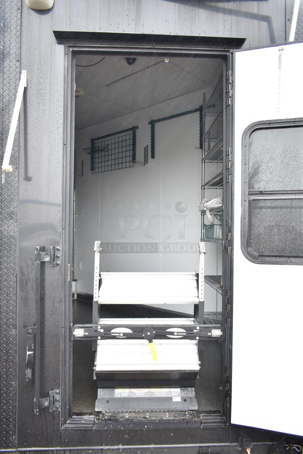 2020 SDG 8.5' x 20' food trailer shell, with wire shelving and Martin IT cabinet, clean title. Ready for customization.