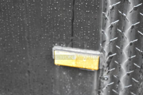 2020 SDG 8.5' x 20' food trailer shell, black exterior, ready to be equipped. Includes wire shelving unit and Martin IT/Network Cabinet. Sold with clear title.