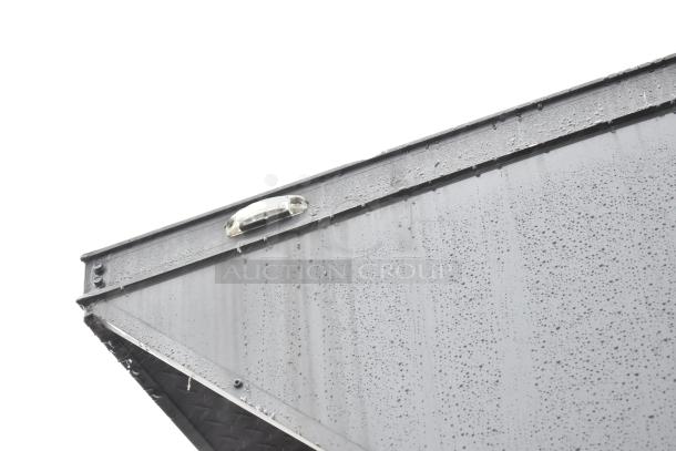 2020 SDG 8.5' x 20' food trailer shell exterior with rain droplets, ready for customization. Clear title included.