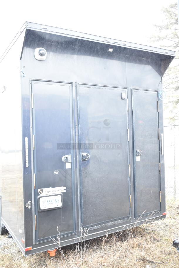 2020 SDG 8.5' x 20' black food trailer shell, ready for customization, clear title, visible license plate and security locks.