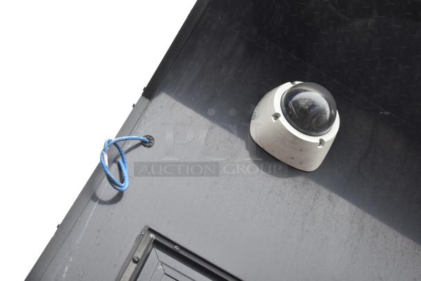 2020 SDG 8.5'x20' food trailer shell detail view, showing a mounted surveillance camera and an ethernet cable.