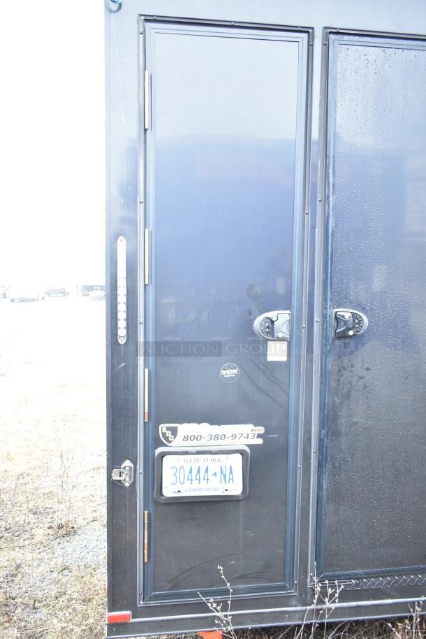 2020 SDG 8.5' x 20' food trailer shell, black exterior, clear title. Features New York license plate, ready to equip.