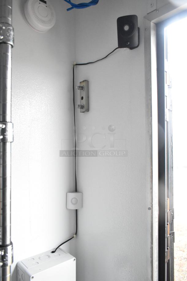 2020 SDG 8.5' x 20' food trailer shell interior. Ready for customization with wiring and mounts visible. Clear title included.