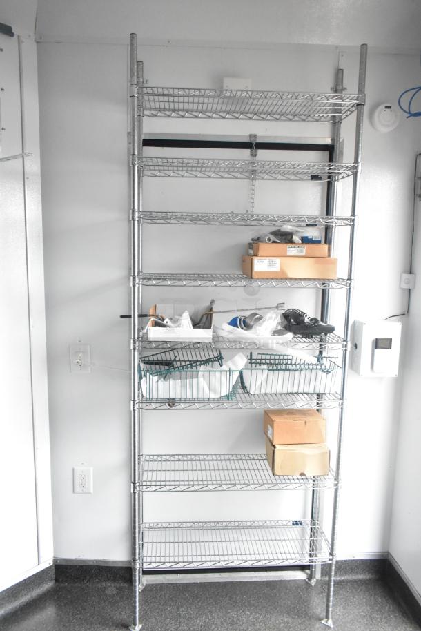 SDG 2020 8.5' x 20' food trailer shell with wire shelving. Ready for customization. Includes sink setup, Martin IT/Network cabinet. Clear title.