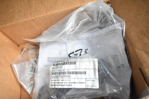 Plastic bag inside a box with a label showing "Supplier Part No: OL2331D, Serial No: 3A2007X01692, Made in Philippines."