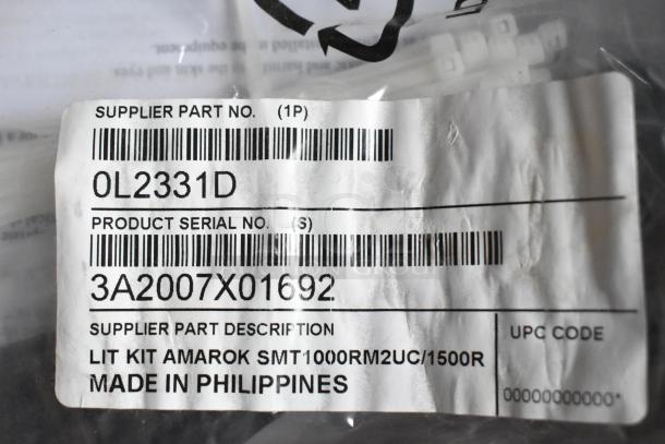Alt text: Bag with label showing part no. OL2331D, serial no. 3A2007X01692, Lit Kit Amarok SMT1000RM2UC/1500R, made in Philippines.