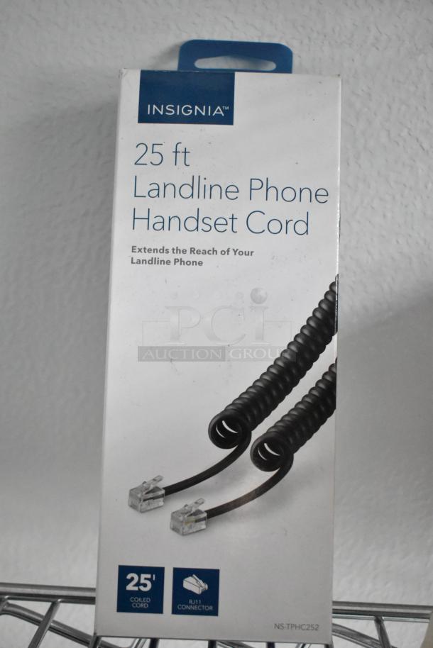Insignia 25 ft landline phone handset cord packaging, featuring a coiled cable and RJ11 connector with extended reach.