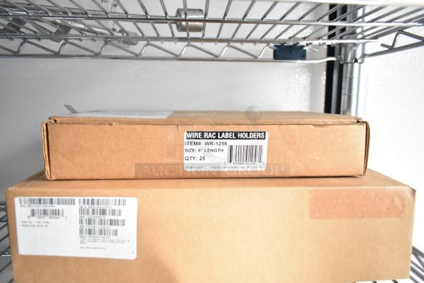 Cardboard boxes on wire shelving; top box labeled "Wire Rac Label Holders," item WR-1256, 6" length, quantity 25.