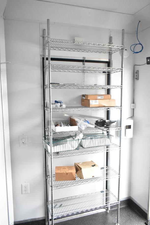 2020 SDG 8.5' x 20' food trailer shell with wire shelving inside; ready to be equipped. Sold with a clear title.